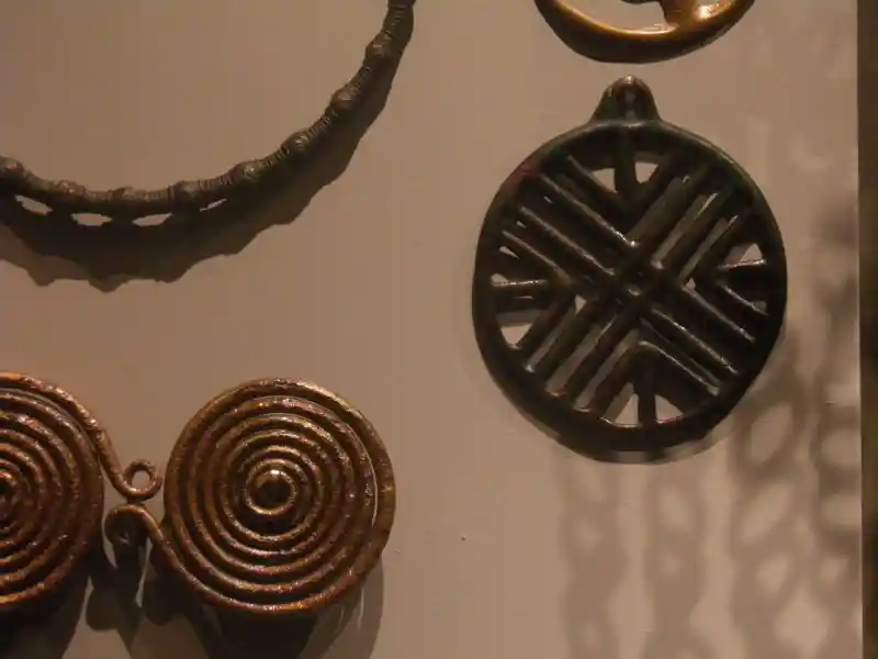 Three-layered solar cross pendant